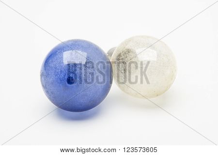 blue and white vintage flash bulb against white background
