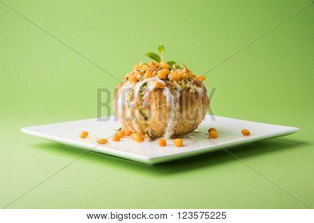 Rajasthani Shahi Raj Kachori, stuffed katchori with potato and sprout filling and served with curd, chutney and sev