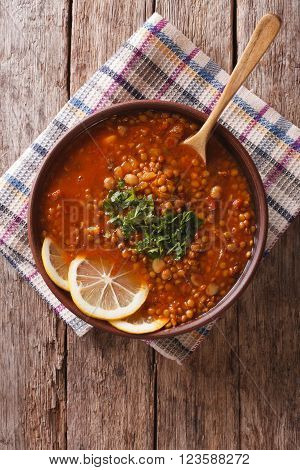 Thick Moroccan Soup In A Bowl On The Table. Vertical View From Above