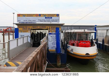 Venice, Italy - March 17, 2016: Vaporetto (water bus) at Venice airport. Vaporettos are a traditional, flat-bottomed Venetian motor boat, well suited to the conditions of the Venetian lagoon