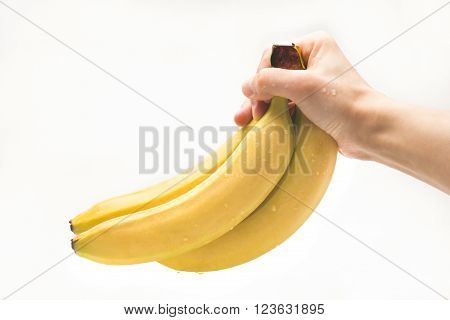 Banana in hand. Isolation on a white background.
** Note: Visible grain at 100%, best at smaller sizes