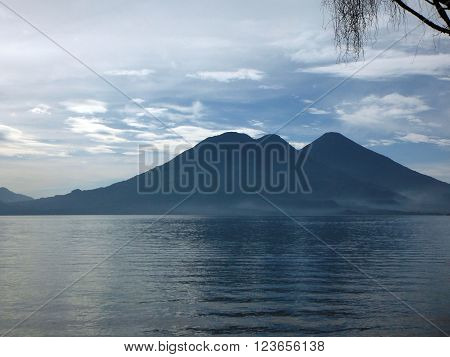Three volcanoes (including Atitlan and Toliman) on a clear morning at the crater lake Lake Atitlan in Guatemala.
** Note: Visible grain at 100%, best at smaller sizes