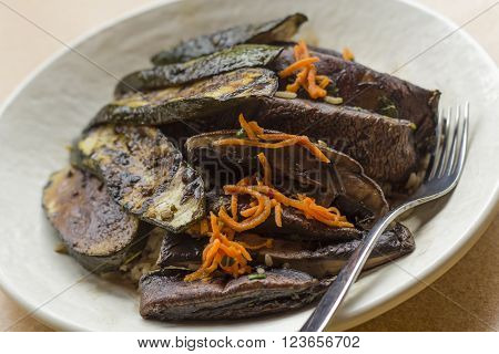 Grilled zucchini and portobello mushrooms in balsamic vinegar glaze with long grain rice
** Note: Shallow depth of field
