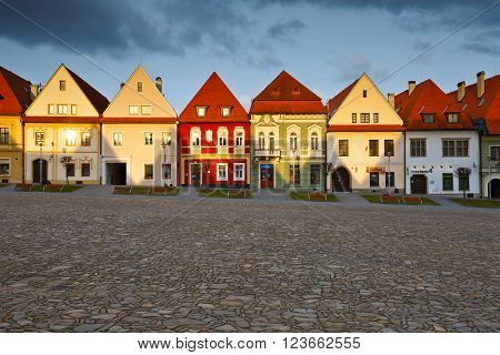 BARDEJOV, SLOVAKIA - MARCH 19, 2016: Town houses in the main square of UNESCO listed medieval town of Bardejov in eastern Slovakia on March 19, 2016.