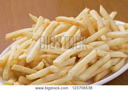 A plate full of delicious shoestring style french fries