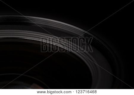 Close up of Lens over black background