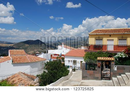 PERIANA, SPAIN - JUNE 1, 2008 - View over the village rooftops towards the mountains Periana Costa del Sol Malaga Province Andalusia Spain Western Europe, June 1, 2008.