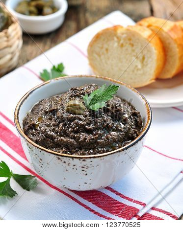 French cuisine - tapenade of olives, capers, anchovies and olive oil.
** Note: Shallow depth of field