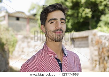 happy young casual man outdoor portrait