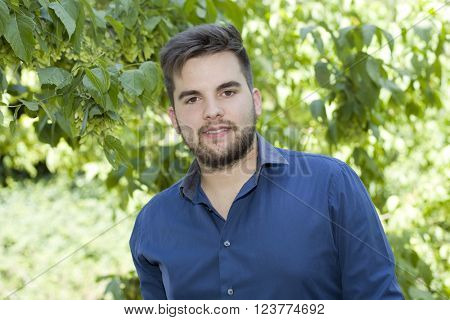happy young casual man outdoor portrait