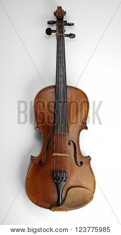Violin (fiddle) front view isolated on white background with clipping path. String instrument of the violin family.