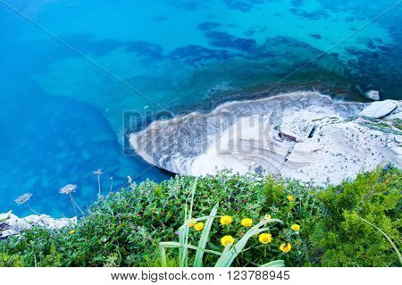 Fossilized piano in coastline near the sea