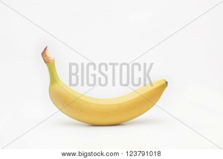 isolated banana with shadow lies on a white background