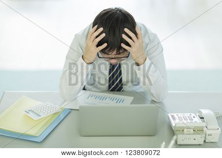 The businessman who is at the wits end, and grieves