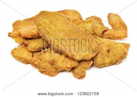 some cooked breaded fillets of seitan on a white background