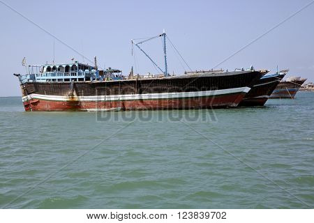 GULF OF ADEN, DJIBOUTI - FEBRUARY 7, 2016: Fishing and cargo ships which are used for transportation between Yemen and Djibouti, for cargo transportation in the Red Sea and Indian Ocean

