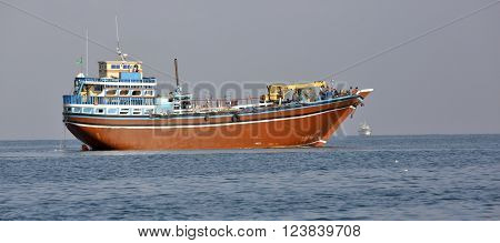 GULF OF ADEN, DJIBOUTI - FEBRUARY 7, 2016: Fishing and cargo ships which are used for transportation between Yemen and Djibouti, for cargo transportation in the Red Sea and Indian Ocean
