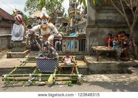 UBUD, BALI - MAR 8, 2016: Unidentified people during the celebration before Nyepi - Balinese Day of Silence. Day Nyepi is also celebrated as New Year - according Balinese calendar now came 1938 year. 
