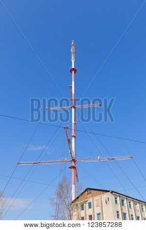 YUZHNO-SAKHALINSK RUSSIA - MARCH 17 2016: Television tower in Yuzhno-Sakhalinsk Russia. Erected in 1960 height 186 m