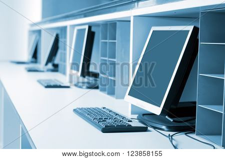 Computer neatly placed in a computer room