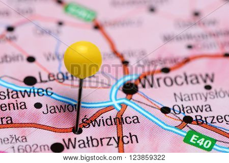 Photo of pinned Swidnica on a map of Poland. May be used as illustration for traveling theme.
