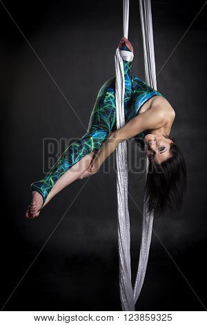 Aerialist Doing Tricks On Silks