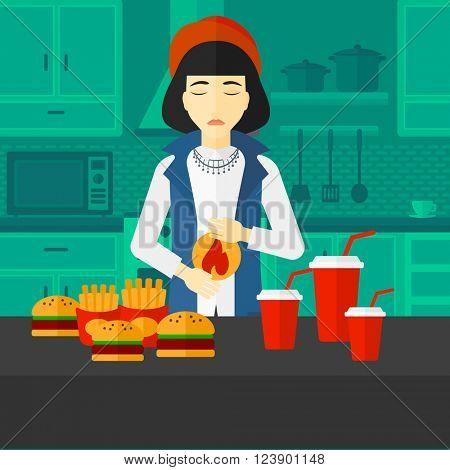 Woman suffering from heartburn.