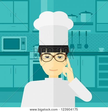 Chef pointing forefinger up.