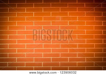 Old vintage orange red brick wall background. Texture pattern of red brick wall for wallpaper.