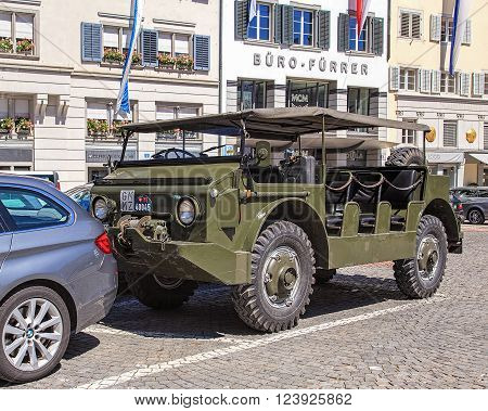 Zurich, Switzerland - 1 August, 2013: a military transporter parked on Munsterhof square. Zurich is the largest city in Switzerland and the capital of the Swiss canton of Zurich.
