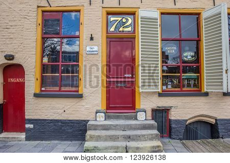 GRONINGEN, NETHERLANDS - MARCH 27, 2016: Entrance of old pub 