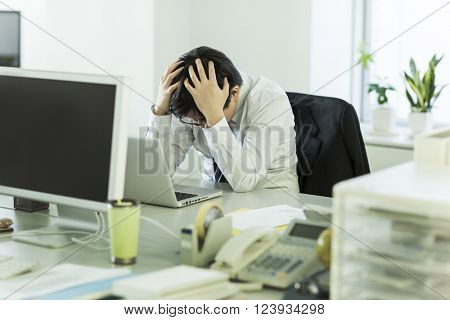 The businessman who is at the wits end, and grieves