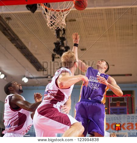 SAMARA RUSSIA - NOVEMBER 06, 2013: BC Royal Hali Gaziantep forward Oliver Stevic (9) throws the ball in a basket during the BC Krasnye Krylia game on November 06 2013 in Samara Russia.