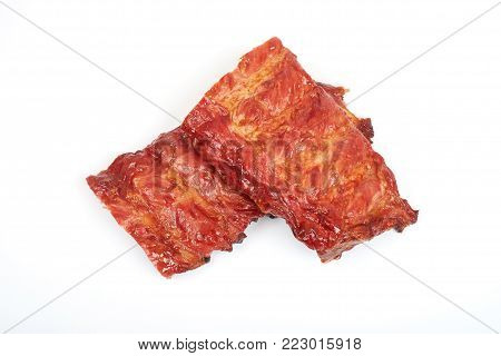 Roasted pork ribs isolated on white background.