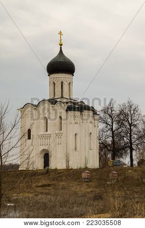 Russian ancient shrine. Orthodox Church of the Intercession on the Nerl River. Spring landscape. Vladimir region.