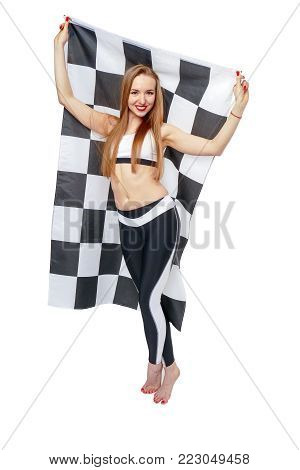 Woman is holding a waving race checkerd flag.