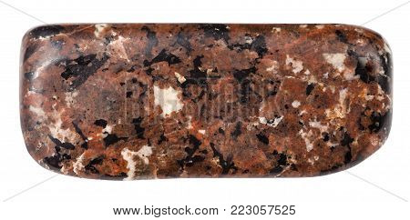 macro shooting of natural mineral rock specimen - polished spreusteined urtite stone isolated on white background from Khibiny Mountains, Kola Peninsula, Russia