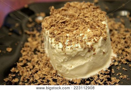 Chocolate Ice Cream And Hardered Chocolate Over