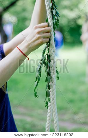 Florist Hands With The Green Branch At Park.