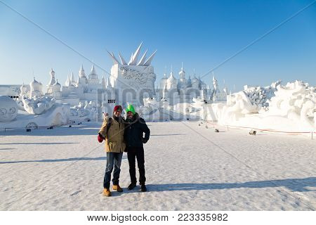 Haerbin, China - January 2015: Gigantic Snow buildings in the 27th China Harbin Sun Island International Snow Sculpture Art Expo. Located in Harbin City, Heilongjiang, China.