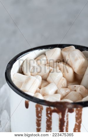 Pieces of chocolate cake from cookies and cocoa with marshmallow on bakery paper High key Still life food style Hugge scandinavian nordic