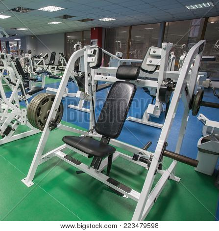 Sport gym interior with a treadmill equipment.