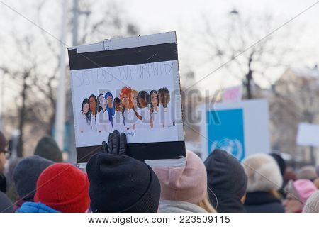 STOCKHOLM, SWEDEN - JAN 21, 2018: Womens March, a worldwide protest for women's rights in central Stockholm, Norrmalmstorg, Sweden, January 21, 2018