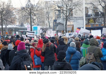 STOCKHOLM, SWEDEN - JAN 21, 2018: Womens March, a worldwide protest for women's rights in central Stockholm, Norrmalmstorg, Sweden, January 21, 2018