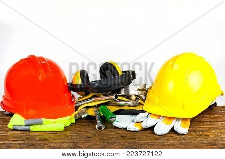 tools set and helmet  on wood planks.selective focus.