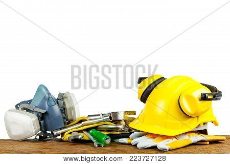 tools, helmet and filter toxins on wood planks.selective focus.