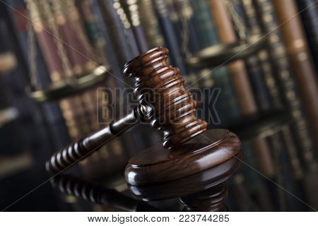 Legal system. Law and justice concept. Gavel of the jugde  in the court library.