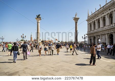 VENICE - JULY 1: San Marco square and the columns of San Marco and San Todaro on July 1, 2017 in Venice, Italy