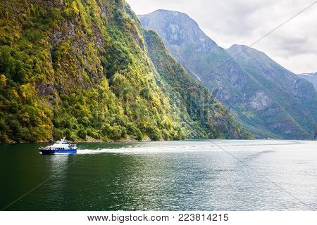 Landscape with Naeroyfjord and high mountains in Norway.