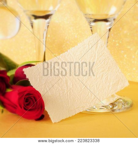 copy space, two champagne glasses and red roses